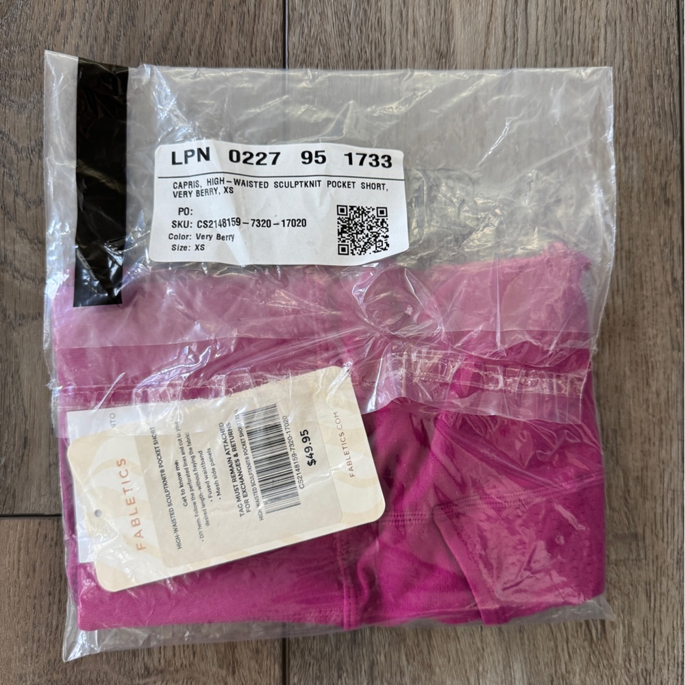 Fabletics High-Waisted SculptKnit Pocket Shorts, Very Berry - Picture 12 of 13